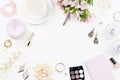 Feminine flat lay with women fashion accessories, lingerie, jewelry, cosmetics, coffee and flowers. Top view Royalty Free Stock Photo