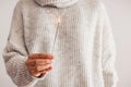 Feminine hand holding a burning Christmas sparkler Royalty Free Stock Photo