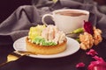 Feminine hygge aesthetic backgound - floral tart, petals, flowers and coffee.