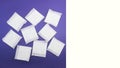 Feminine hygienic white pads for menstruation on a purple background very peri