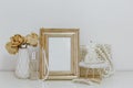 Feminine Mockup vintage gold frame with fluffy branches Royalty Free Stock Photo