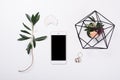 feminine tabletop flatlay with smartphone mock-up Royalty Free Stock Photo