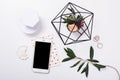 feminine tabletop flatlay with smartphone mock-up Royalty Free Stock Photo