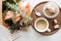 Feminine tabletop, home office with flowers Royalty Free Stock Photo