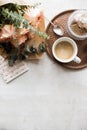 Feminine tabletop, home office with flowers Royalty Free Stock Photo