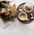 Feminine tabletop, home office with flowers Royalty Free Stock Photo