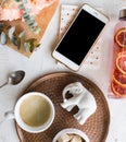 Feminine tabletop, home office with flowers Royalty Free Stock Photo