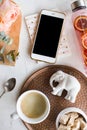 Feminine tabletop, home office with flowers Royalty Free Stock Photo