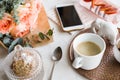 Feminine tabletop, home office with flowers Royalty Free Stock Photo