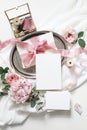 Feminine vertical wedding, birthday mock-up scene. Blank paper greeting cards, eucalyptus, pink roses, peony flowers on