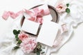 Feminine wedding, birthday mock-up scene. Blank paper greeting cards, envelope, eucalyptus, pink roses, peony flowers