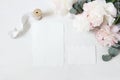 Feminine wedding, birthday table composition with floral bouquet. White and pink peonies flowers, eucalyptus and silk Royalty Free Stock Photo