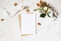 Feminine winter wedding, birthday stationery mock-up scene. Blank greeting card, envelope. Dry hydrangea, white roses