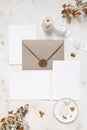 Feminine winter wedding, birthday stationery mock-ups scene. Blank greeting cards, envelope, wax seal, dry hydrangea and
