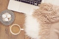 Feminine workplace concept. Freelance workspace with laptop,sweets. Blogger working. Royalty Free Stock Photo