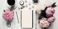 Feminine workspace stylish office writing supplies and pink peonies on a white background