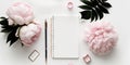 Feminine workspace stylish office writing supplies and pink peonies on a white background