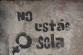 Feminist phrase after a protest on wall `You are not alone` `No estÃÂ¡s sola`