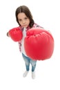 Feminist upbringing and female rights. Fight for her rights. Female rights and liberties. Girl boxing gloves ready to