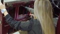 feminized girl master service the blonde working on the old car in to the mechanic for repair