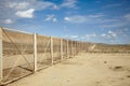 Fence in Azerbaijan desert surrounding Gobustan National Park