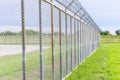 Fence with barbed wire