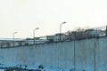 Fence with barbed wire, place of detention