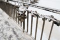 The fence of the bridge with the symbols of a strong marriage union, closed locks. Winter.