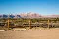 Fence in empty trailhead parking lot in the Utah desert