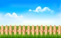 A fence in a field. Royalty Free Stock Photo