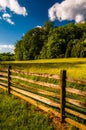 Fence, field and trees under a beautiful spring sky, at Antietam National Battlefield