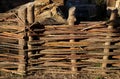 Fence in the form of a rural wattle fence Royalty Free Stock Photo