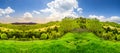 Fence on hillside meadow in mountain Royalty Free Stock Photo