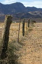 Fence line along Moralana Scenic Drive, Flinders` Ranges, SA, Australia Royalty Free Stock Photo