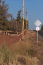 Fence line and road to the horizon