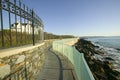 Fence lines the Cliff Walk, Cliffside Mansions of Newport Rhode Island Royalty Free Stock Photo