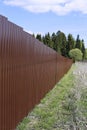 Fence made of brown metal professional flooring