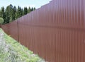 Fence made of brown metal professional flooring Royalty Free Stock Photo