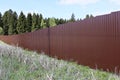 Fence made of brown metal professional flooring Royalty Free Stock Photo