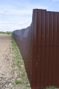 Fence made of brown metal professional flooring Royalty Free Stock Photo