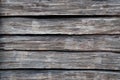 A fence made of old unpainted wooden boards for a natural gray background Royalty Free Stock Photo