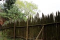 fence made of sharp wooden posts for protection