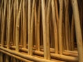 A fence made of thin branches. Related tree branches. A lot of wooden rods Royalty Free Stock Photo