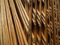 A fence made of thin branches. Related tree branches. A lot of wooden rods Royalty Free Stock Photo