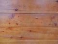 A fence made of wooden planks close-up Royalty Free Stock Photo