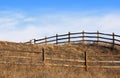 Fence Over the Top of a Hill With Gate