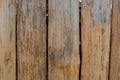 Fence, palings of unrefined wood.
