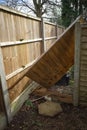 Fence panel blown down by strong winds. Surrey, England. Royalty Free Stock Photo