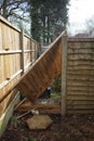 Fence panel blown down by strong winds. Surrey, England. Royalty Free Stock Photo