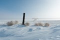 Fence Post in Snow Drift